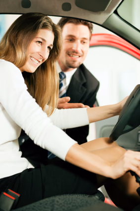 Car Sales Person Offering Test Drive