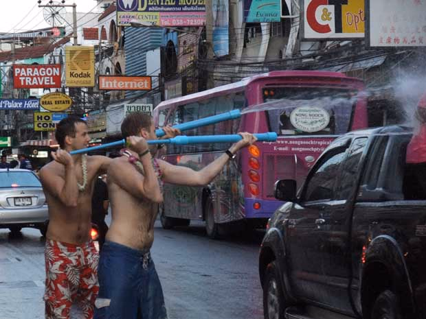 Songkran-2nd-Road, people shooting water at car