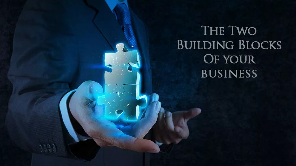 2 puzzle pieces representing building blocks of business