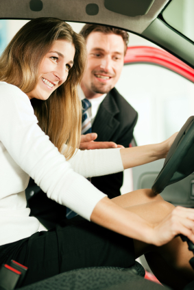Car Sales Person Offering Test Drive