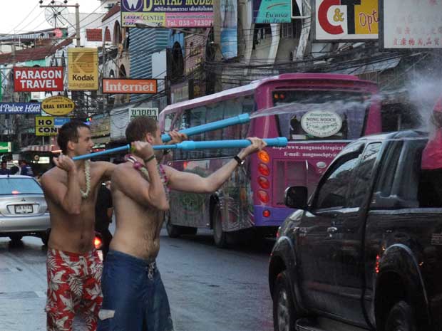Songkran-2nd-Road, people shooting water at car