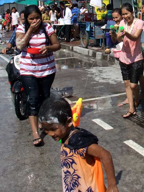 songran kid with waterpistol